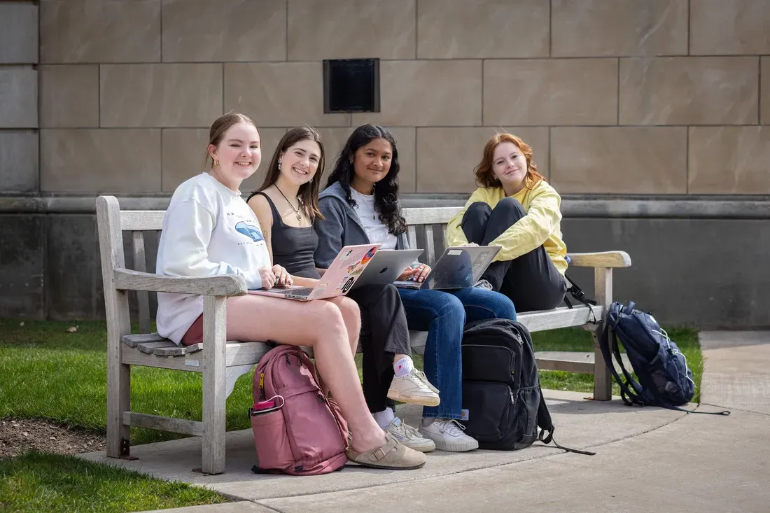 People sitting on a bench.